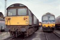 58012 at Toton Depot 58012 is surrounded by different type 5 locos, including 59005, at an open day at Toton depot on 29th August 1998. 58012 at Toton Depot 58012 is surrounded by different type 5 locos, including 59005, at an open day at Toton depot on 29th August 1998.