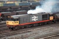 58038 at Toton yard 58038 creates some atmosphere as it departs the former hump reception roads at Toton yard with a loaded MGR train on 24th April 1987. 58038 at Toton yard 58038 creates some atmosphere as it departs the former hump reception roads at Toton yard with a loaded MGR train on 24th April 1987.