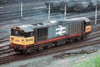 58040 at Toton yard After the hump at Toton had been taken out of use, the reception sidings were used for several years for staging mgr trains from the various pits in the Nottingham coalfield. It was quite easy to photograph the trains from the bank opposite the depot. 58040 runs back onto its train past the white posts that once held the signals controlling shunting over the hump. 58040 at Toton yard After the hump at Toton had been taken out of use, the reception sidings were used for several years for staging mgr trains from the various pits in the Nottingham coalfield. It was quite easy to photograph the trains from the bank opposite the depot. 58040 runs back onto its train past the white posts that once held the signals controlling shunting over the hump.